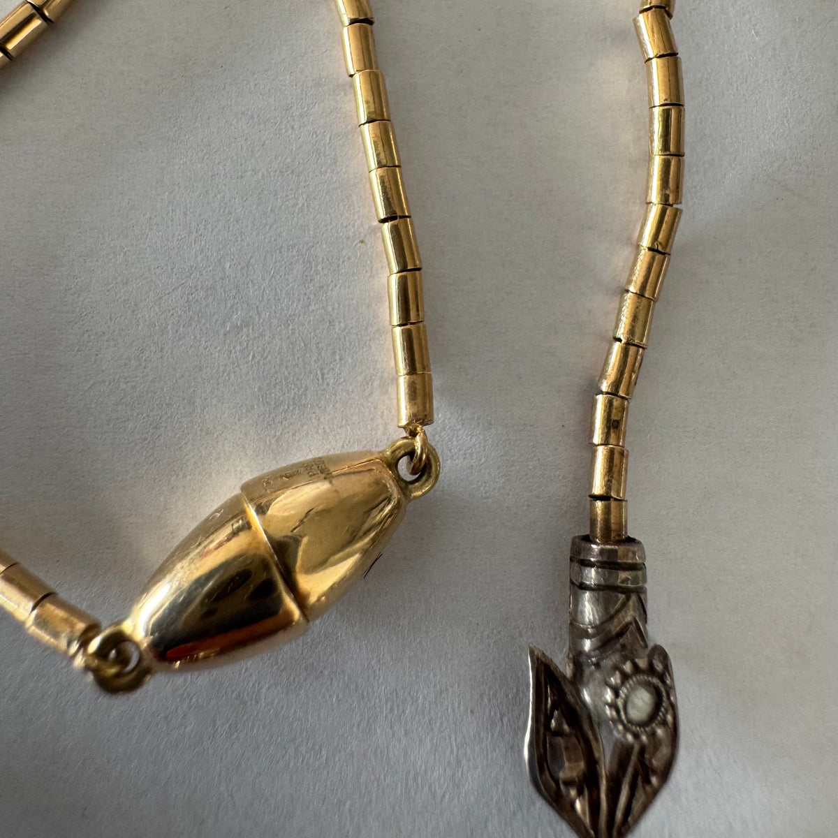 14K Gold Necklace with Pearls
Floral design & Diamonds with delicate details and a magnetic clasp.