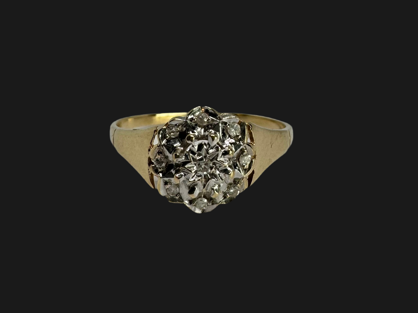 14K gold ring set with Diamonds