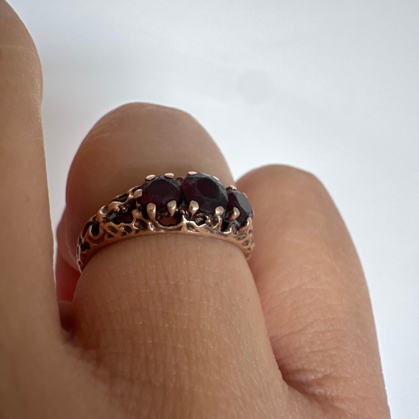 9K gold ring set with deep red Garnet stones