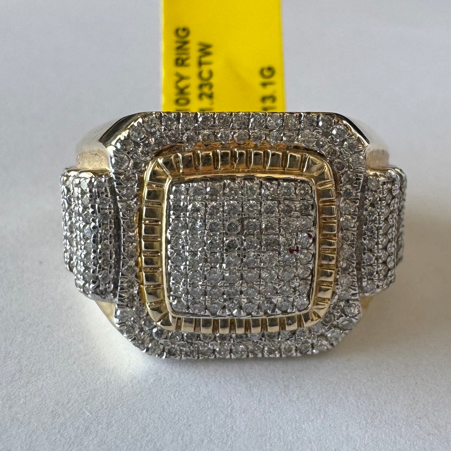 10K gold ring set with sparkling Diamonds in a bold geometric design.