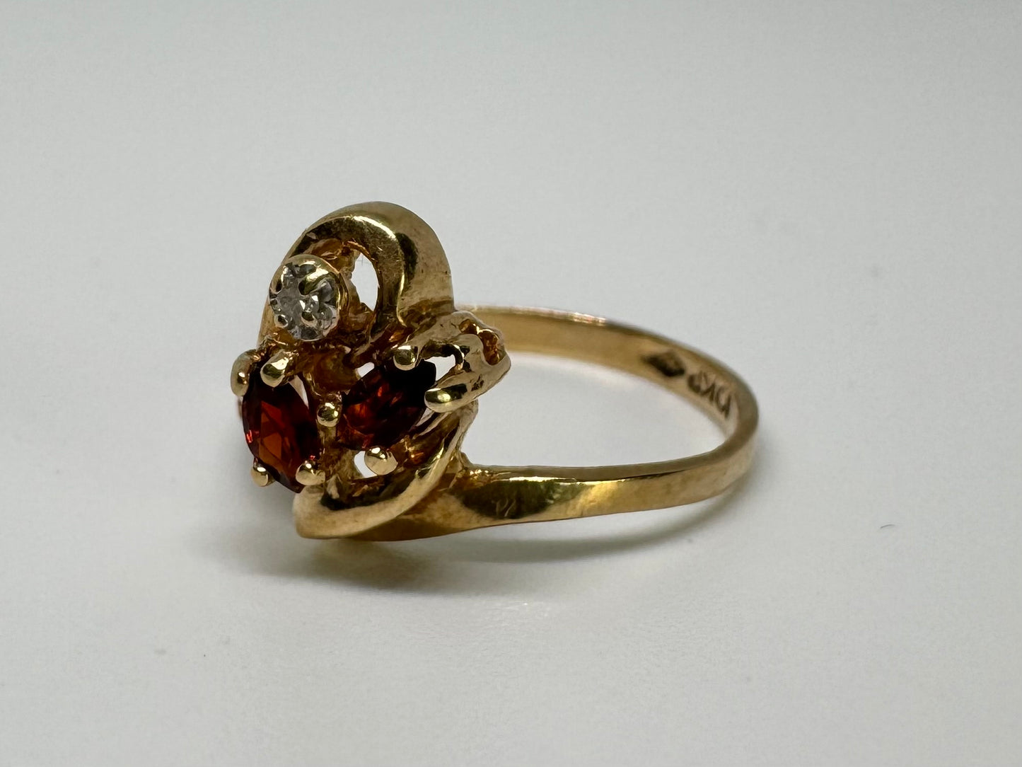 10K gold ring set with Garnet & Diamonds