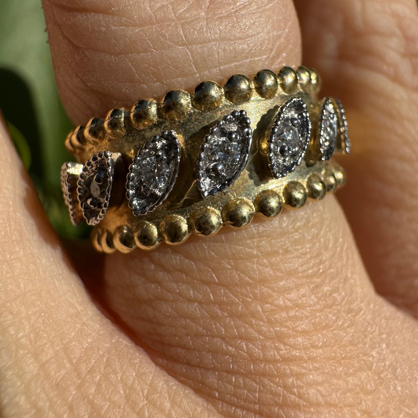 14K gold ring set with Diamonds