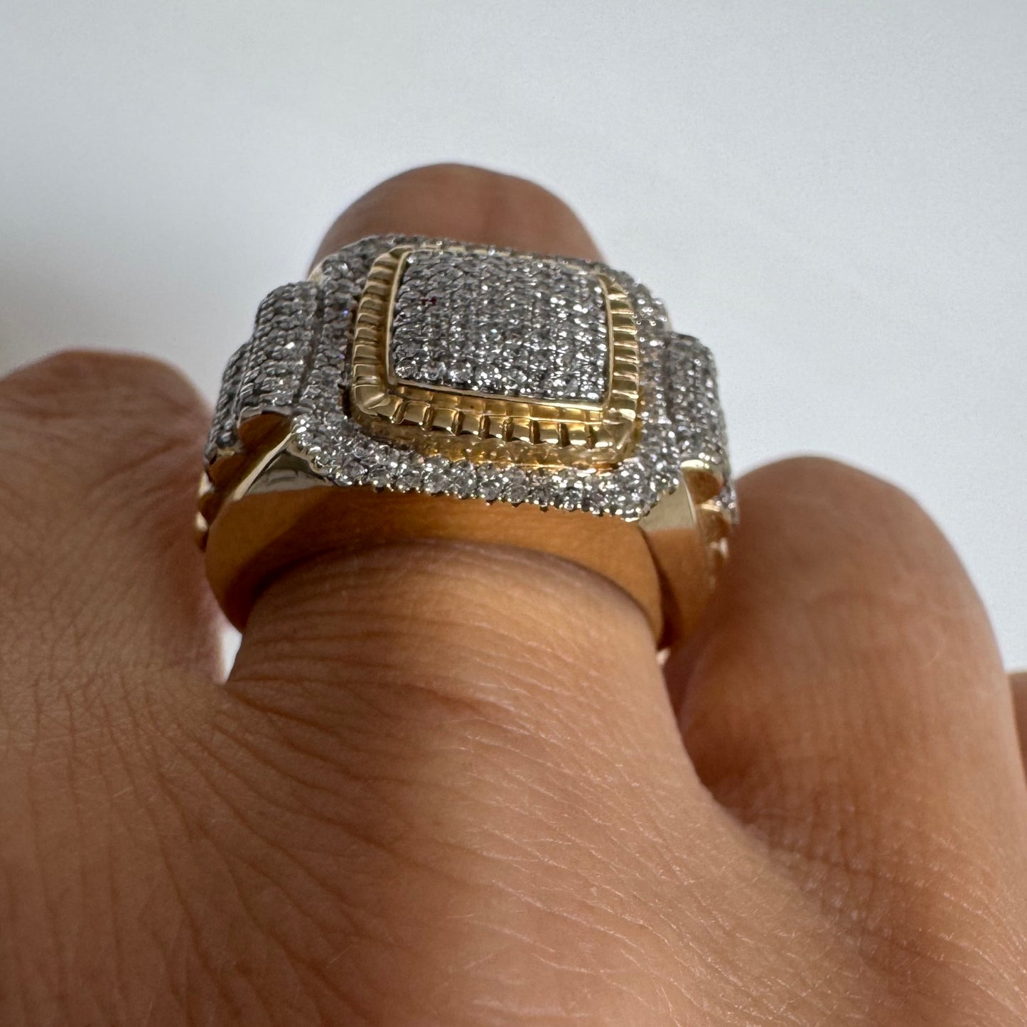 10K gold ring set with sparkling Diamonds in a bold geometric design.