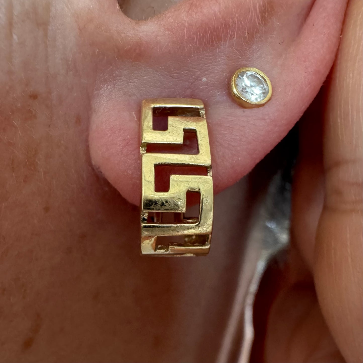 14K gold earrings featuring a geometric design