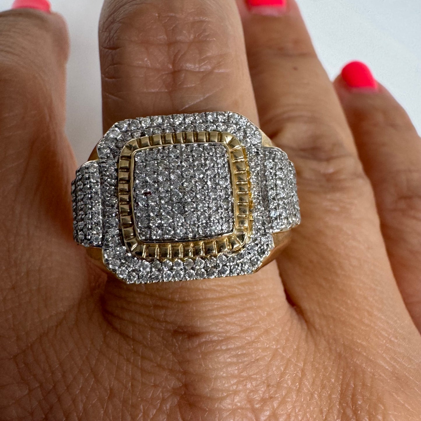 10K gold ring set with sparkling Diamonds in a bold geometric design.