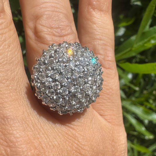18K gold ring set with Diamonds in a bold pavé setting.