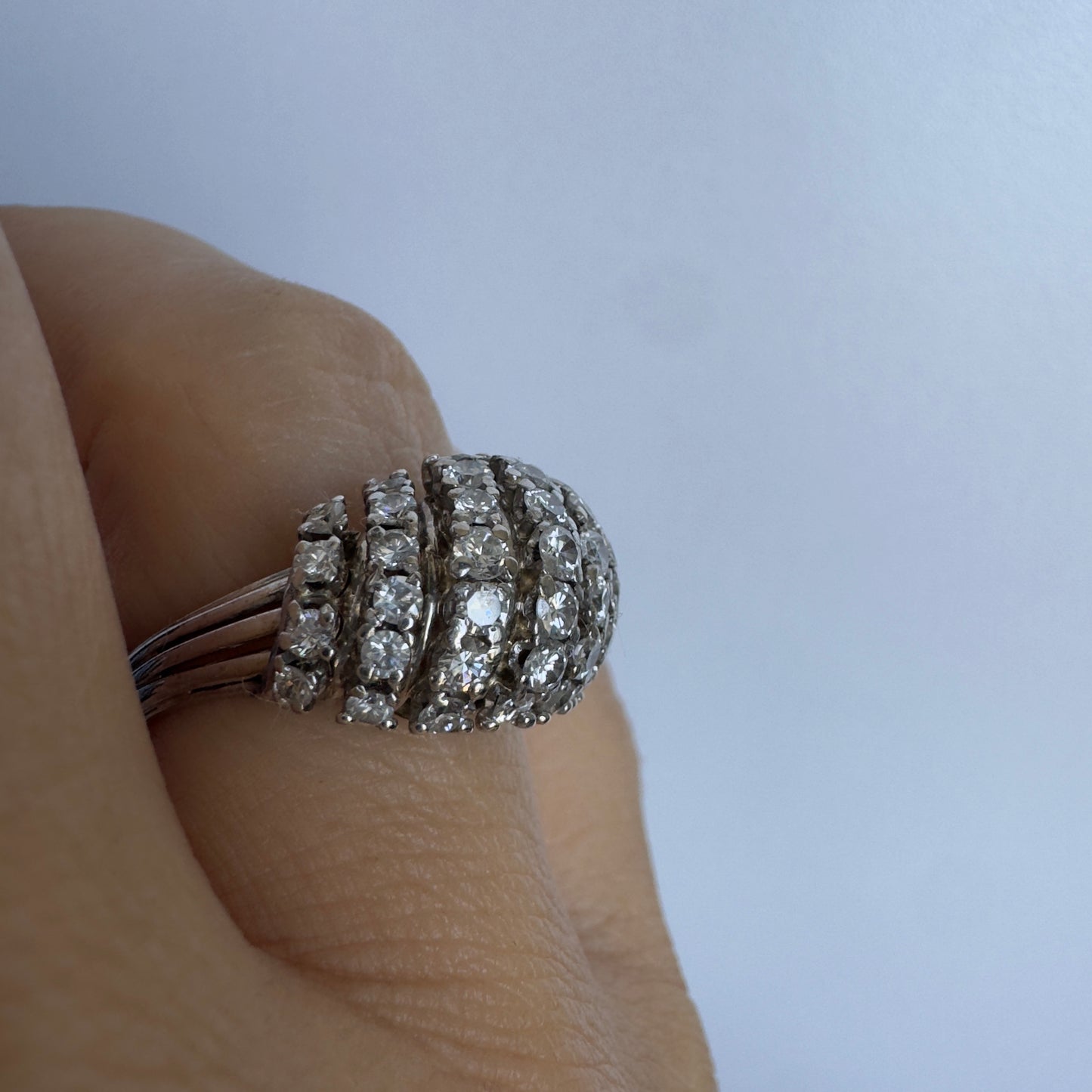 18K gold ring set with rows of sparkling Diamonds in a bold, sculptural design