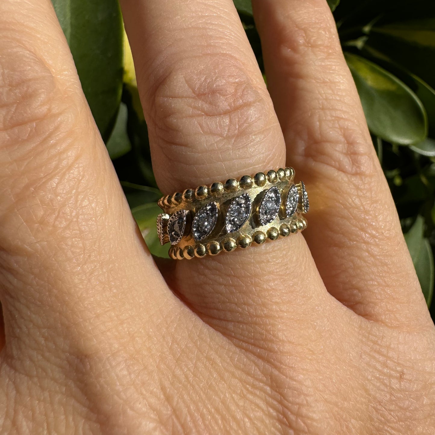 14K gold ring set with Diamonds