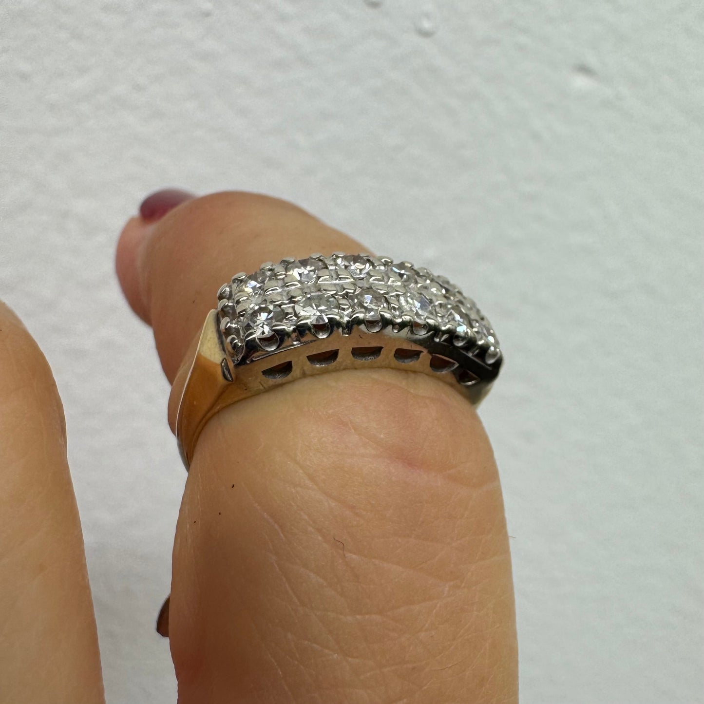 9K (14K) gold ring set with Diamonds in a bold, wide-band design.