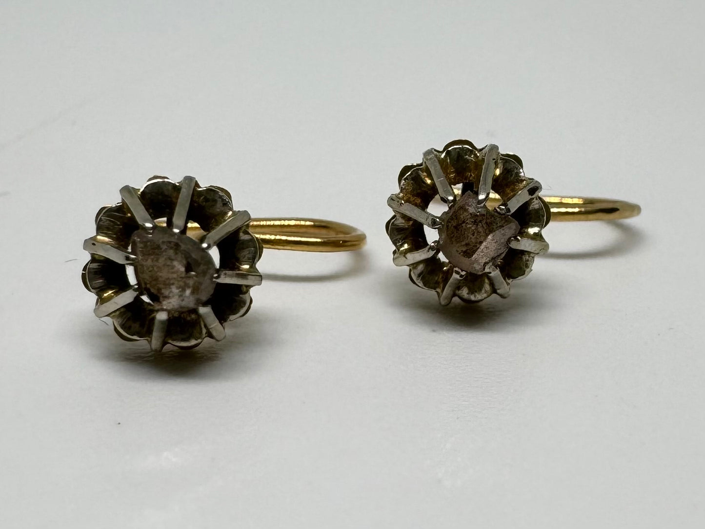 14K gold earrings set with Diamond