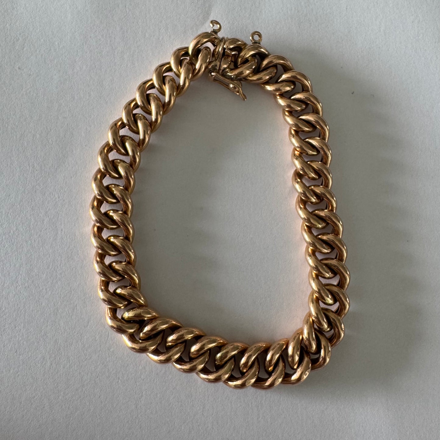 14K gold chain bracelet featuring bold, classic link design.