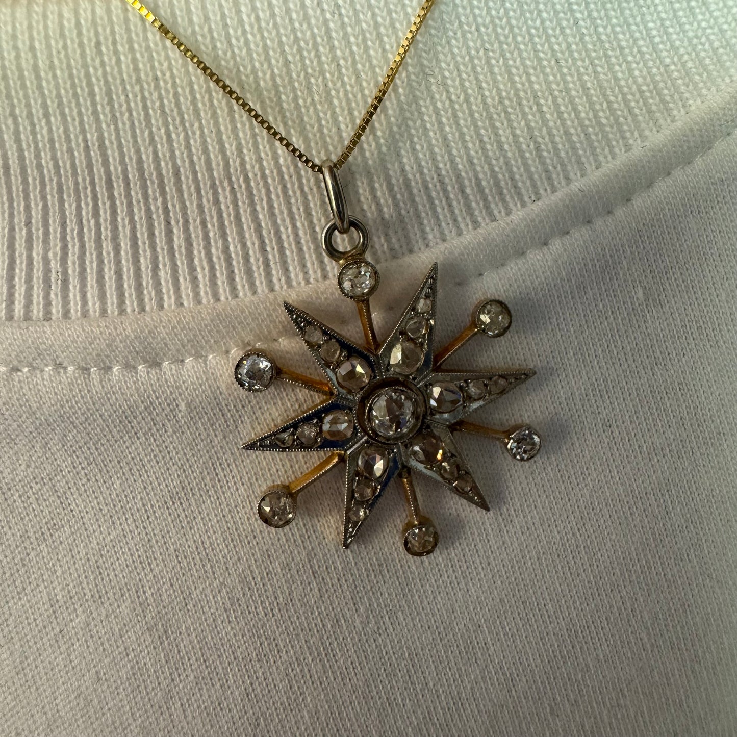 14K gold starburst pendant set with old- cut Diamonds