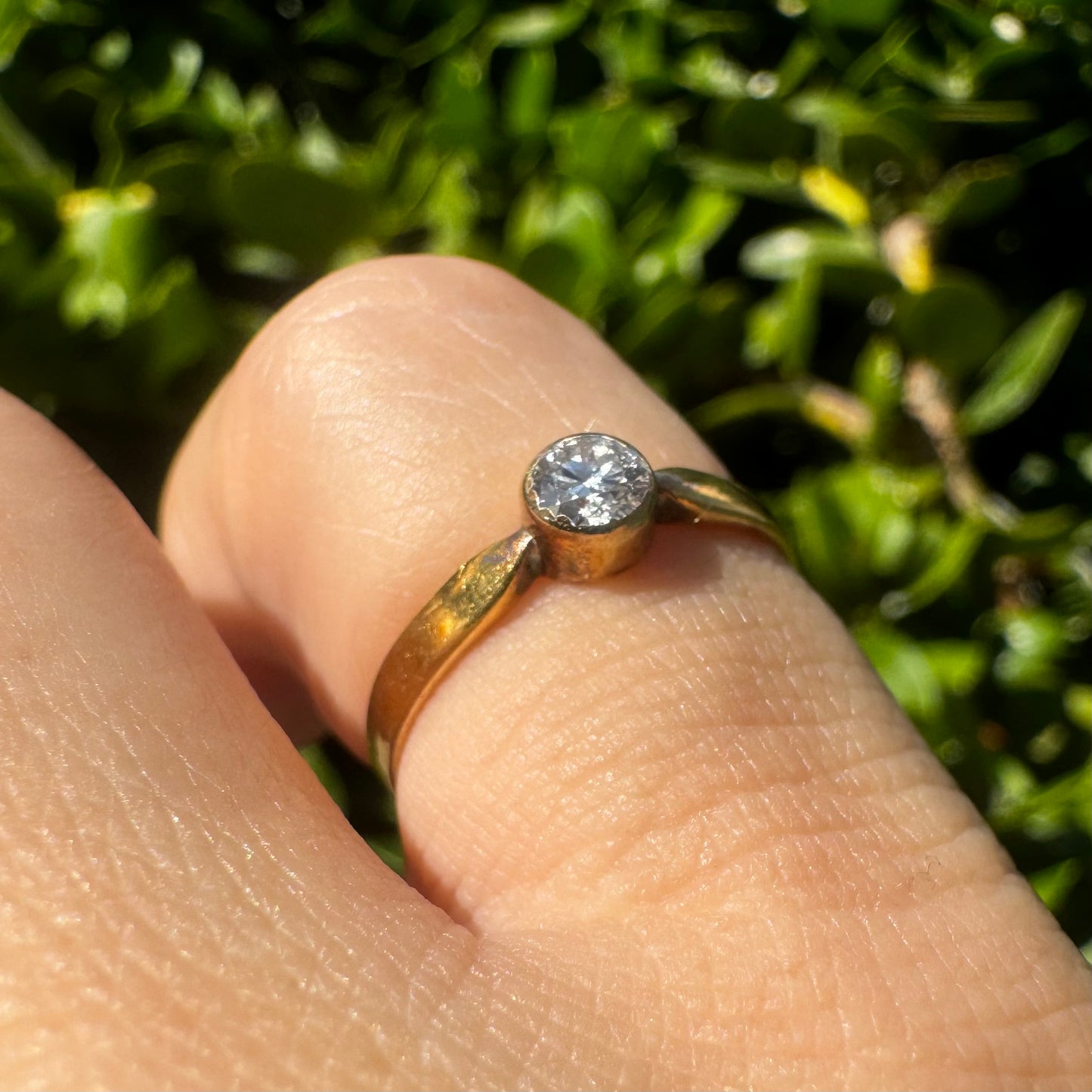 14K gold ring set with one center Diamond