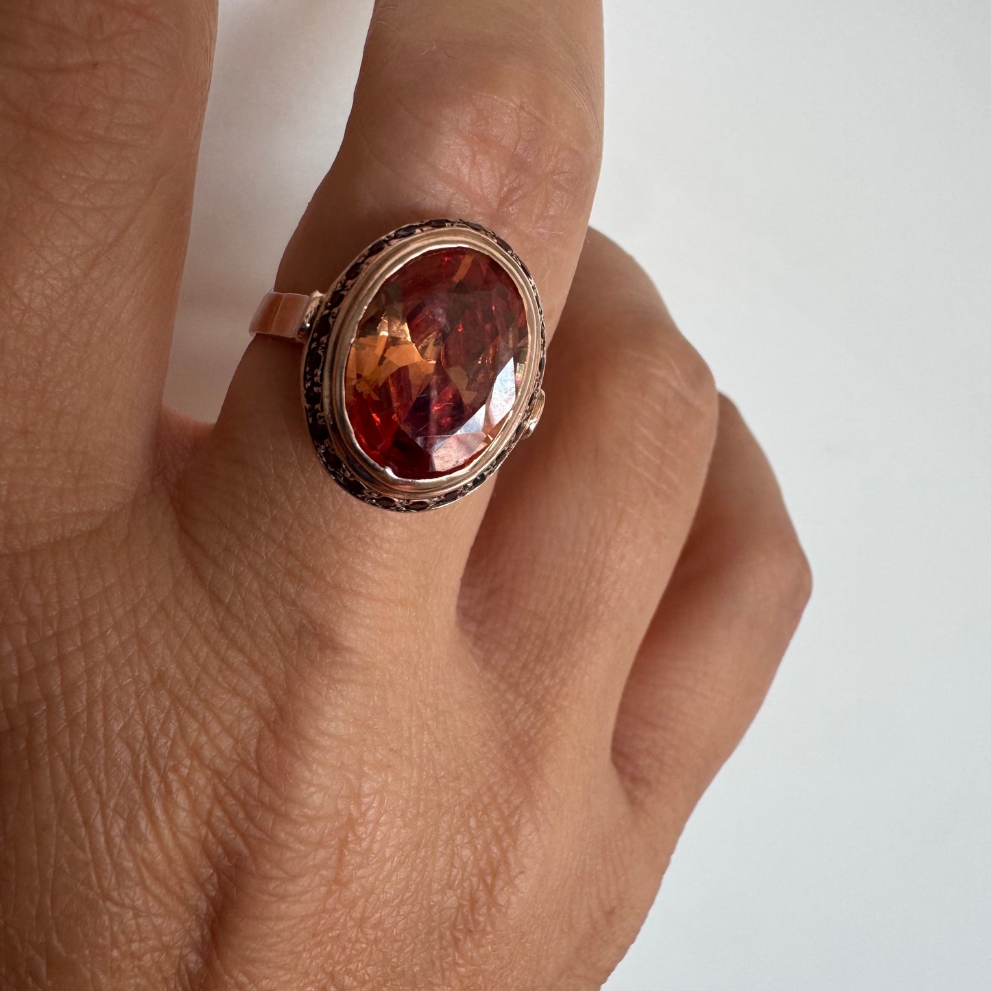 14K gold ring featuring a large cognac-toned Citrine, accented with delicate Ruby stones for a touch of rich color and contrast.