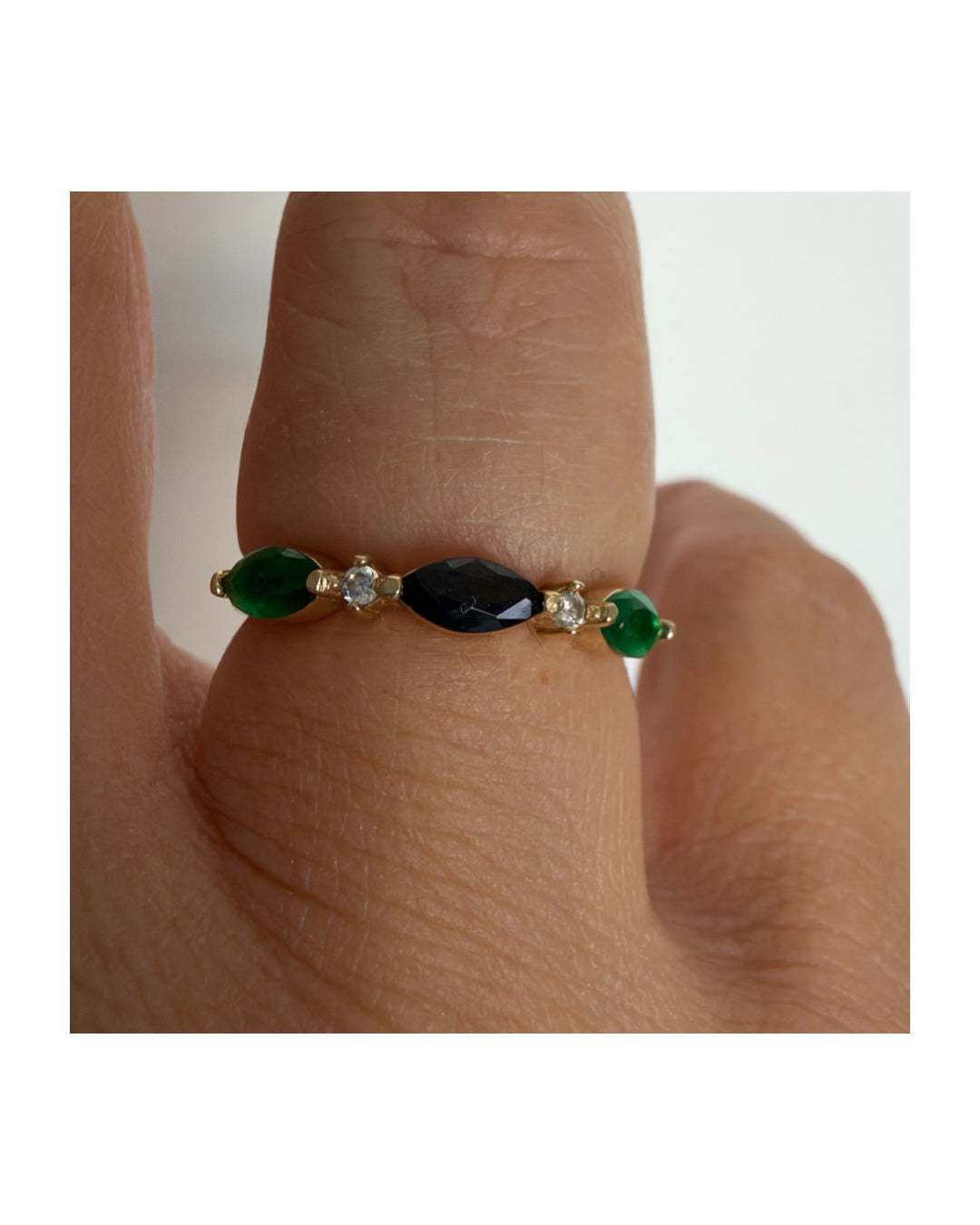 14K yellow gold vintage ring with a marquise-cut sapphire and emeralds