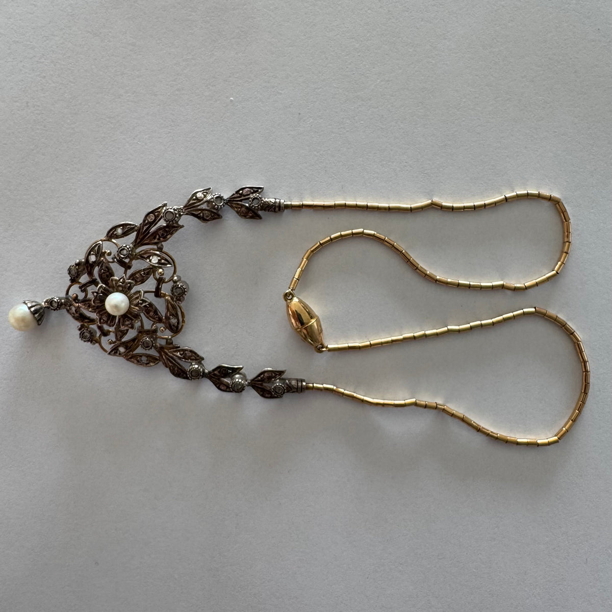 14K Gold Necklace with Pearls
Floral design & Diamonds with delicate details and a magnetic clasp.