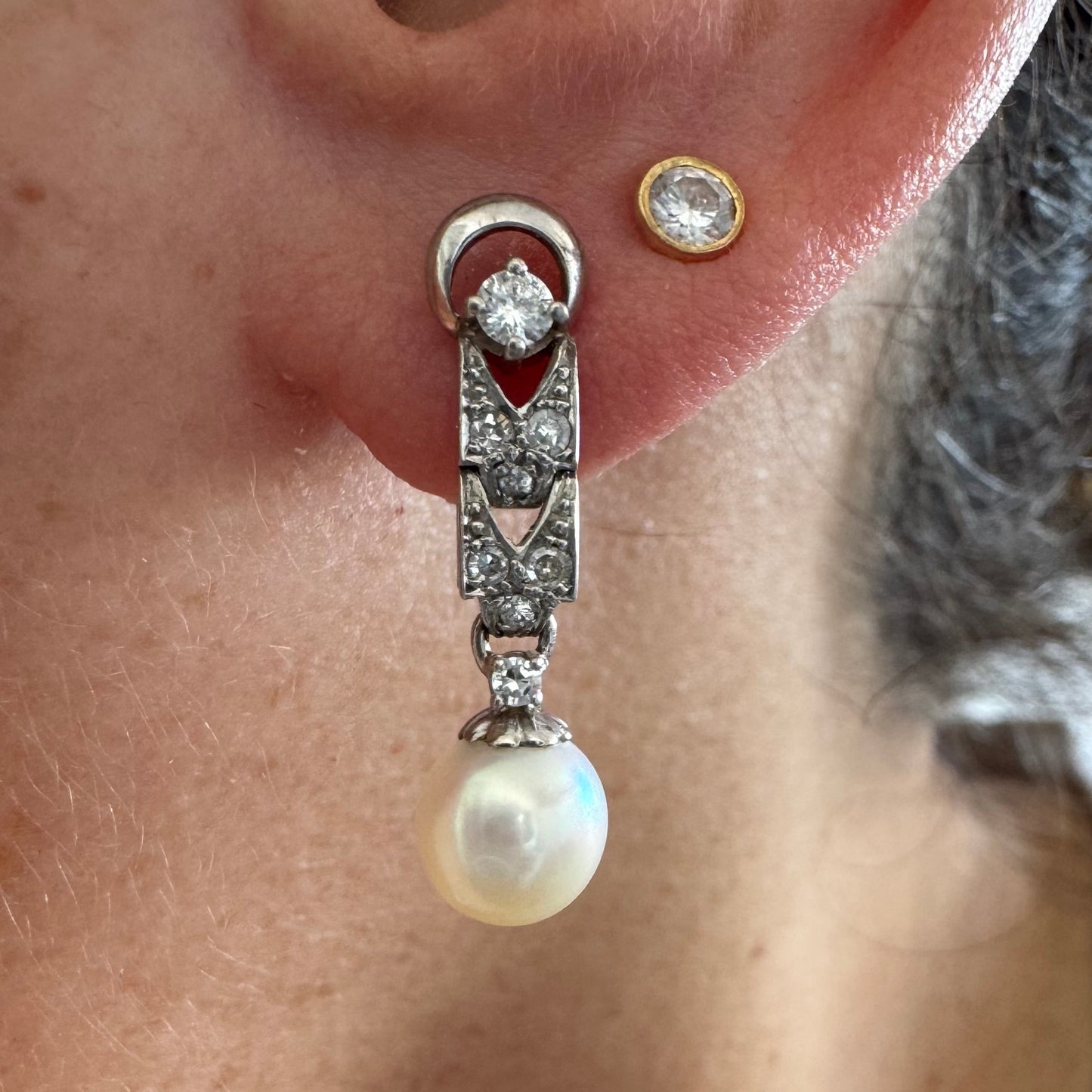 14K gold drop earrings set with Diamonds and a dangling Pearl.