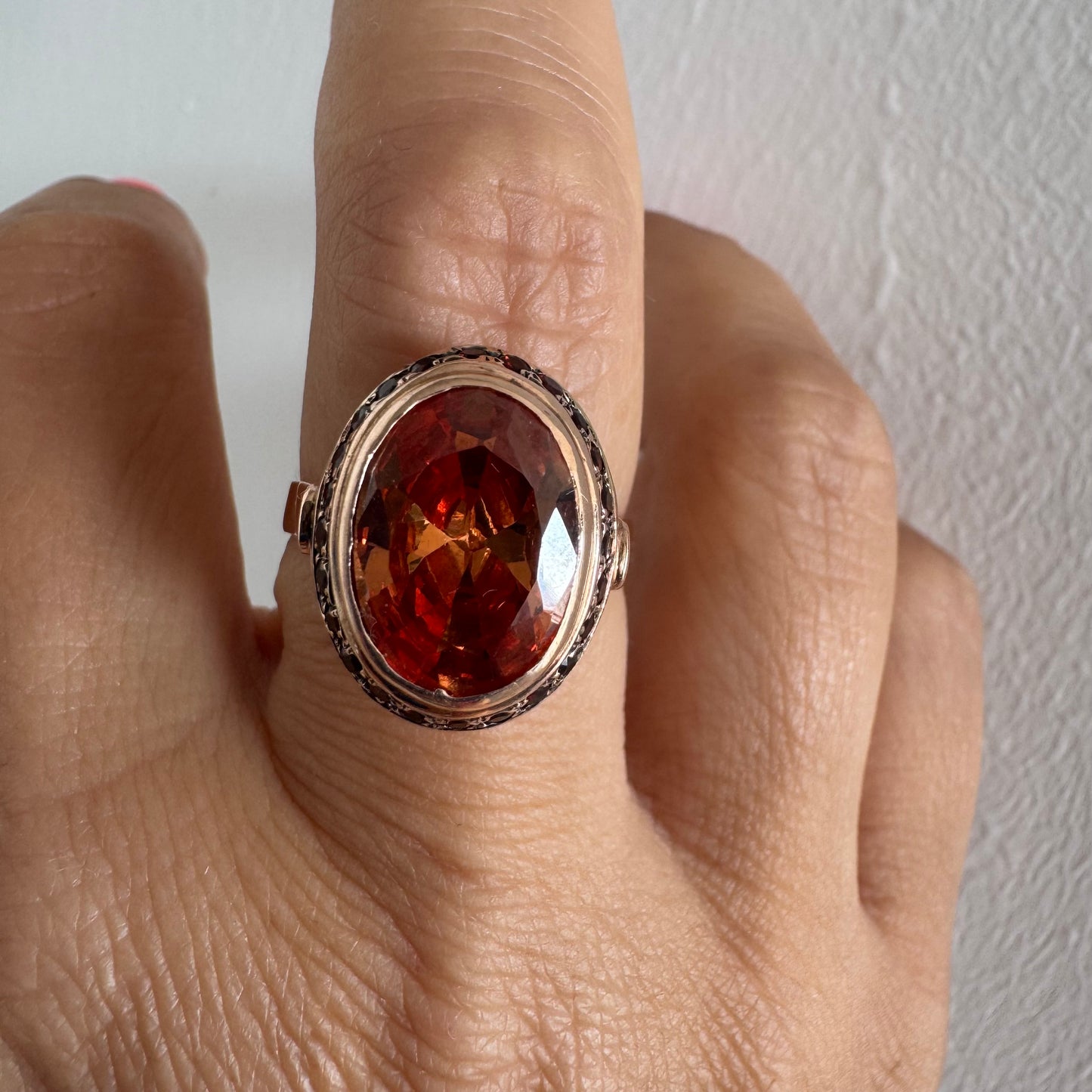 14K gold ring featuring a large cognac-toned Citrine, accented with delicate Ruby stones for a touch of rich color and contrast.