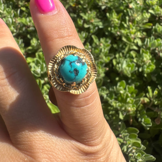 18K gold ring set with a unique Turquoise