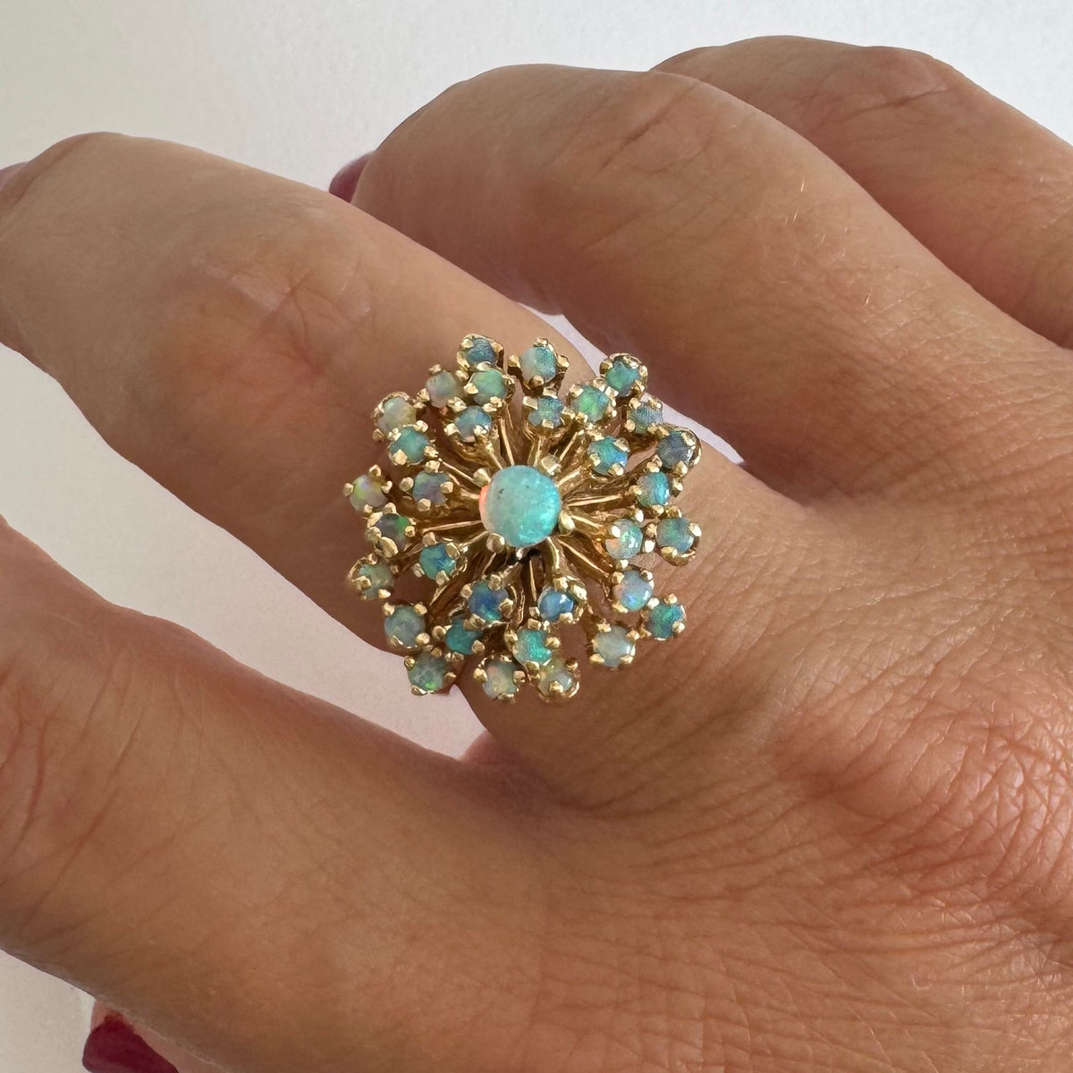 14K gold ring set with Opals