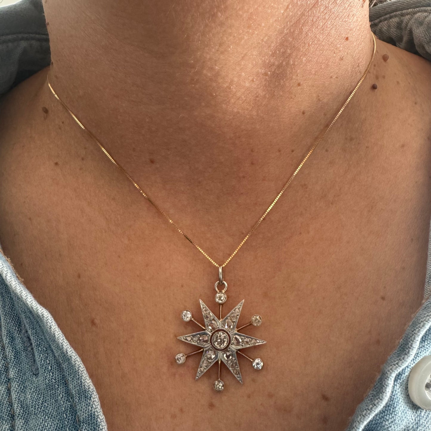 14K gold starburst pendant set with old- cut Diamonds