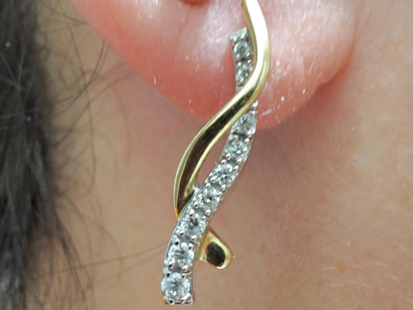 14K gold earrings set with Diamonds