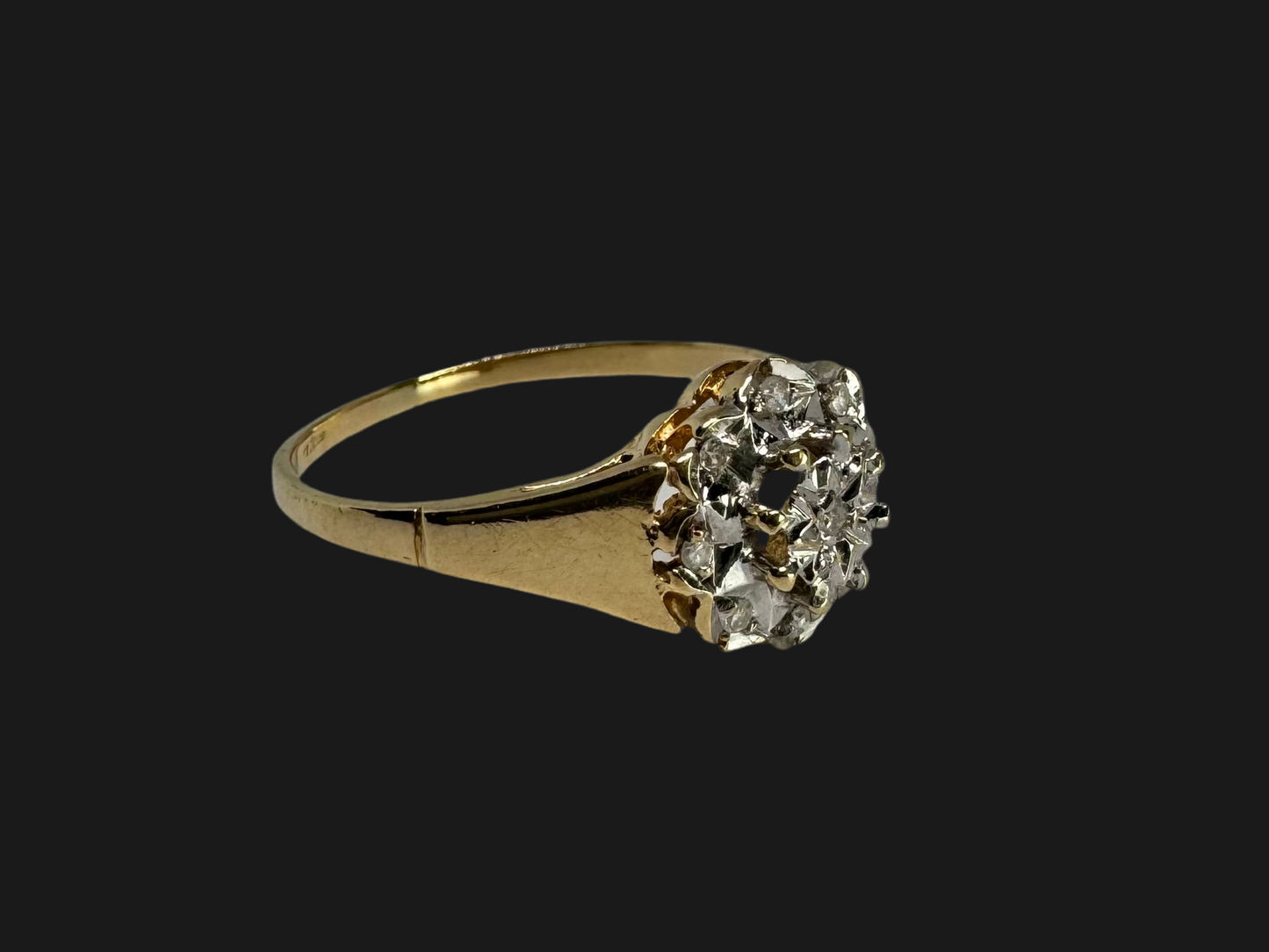 14K gold ring set with Diamonds