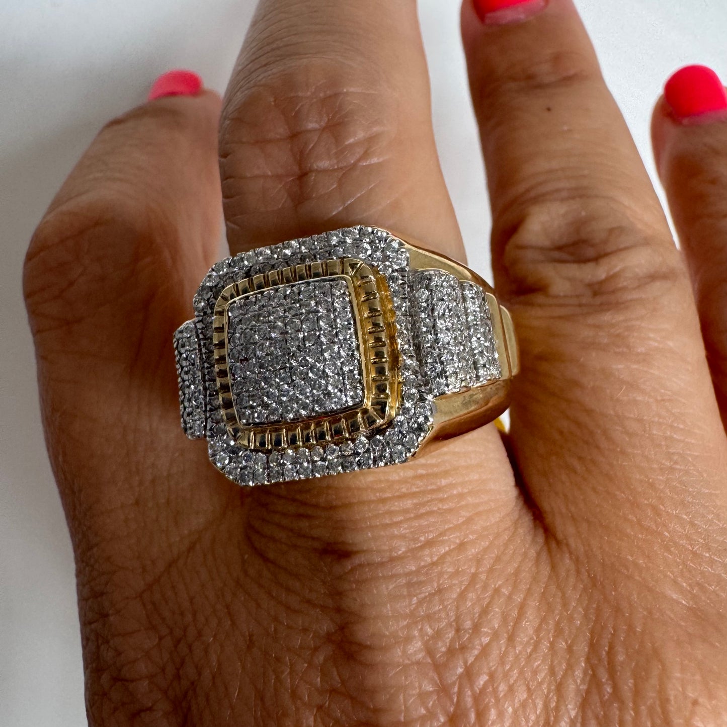 10K gold ring set with sparkling Diamonds in a bold geometric design.
