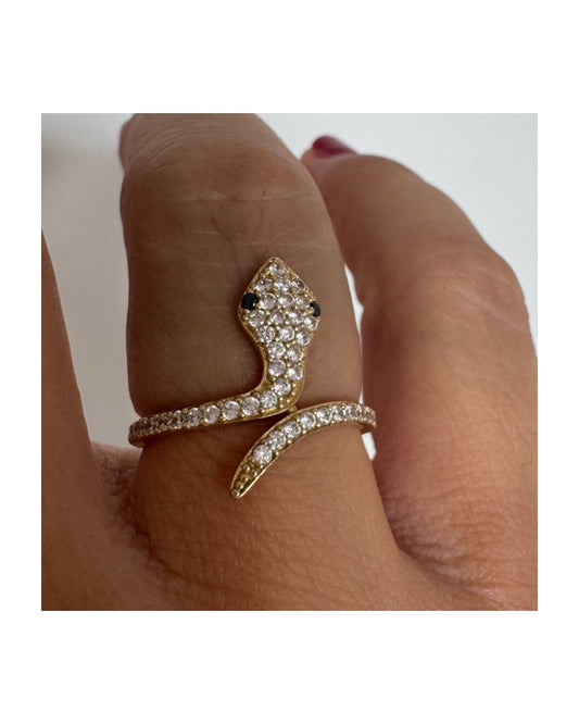 14K gold snake ring set with sparkling white stones & Sapphires eyes.
