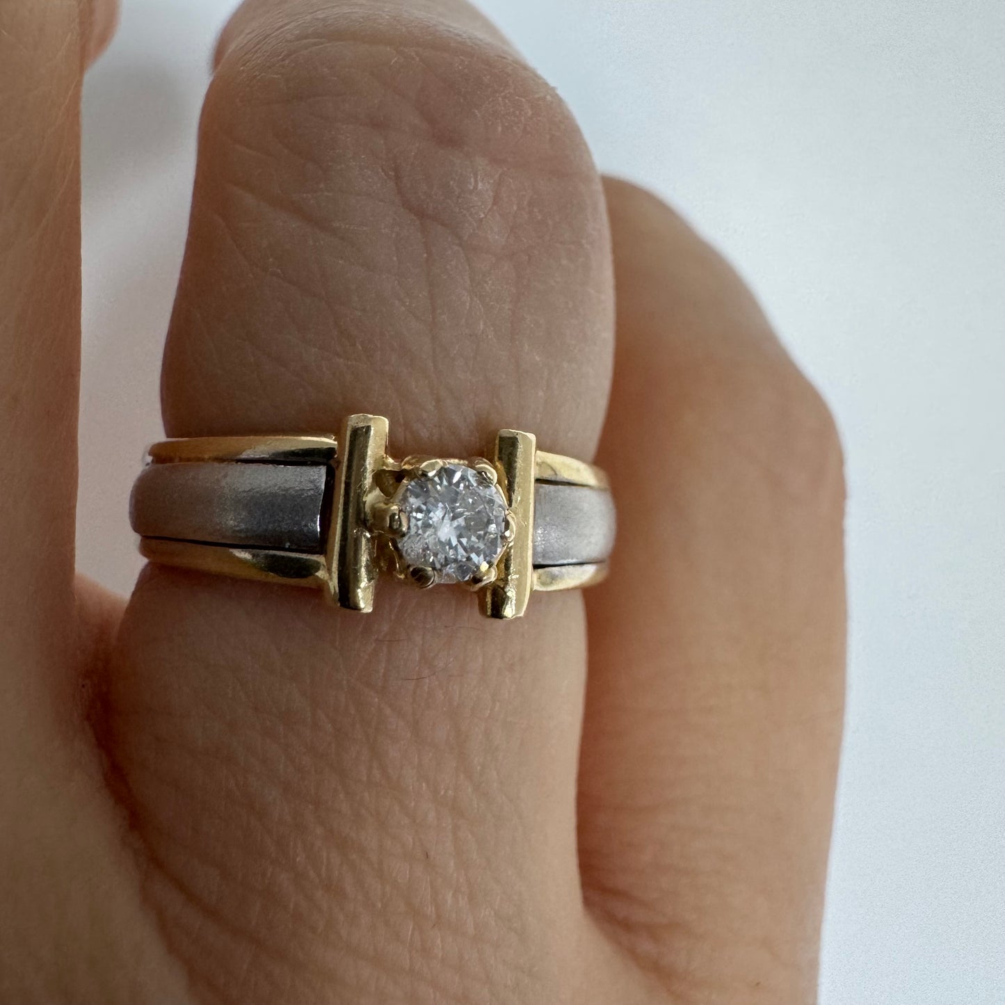 14K two-tone gold ring set with one center Diamond