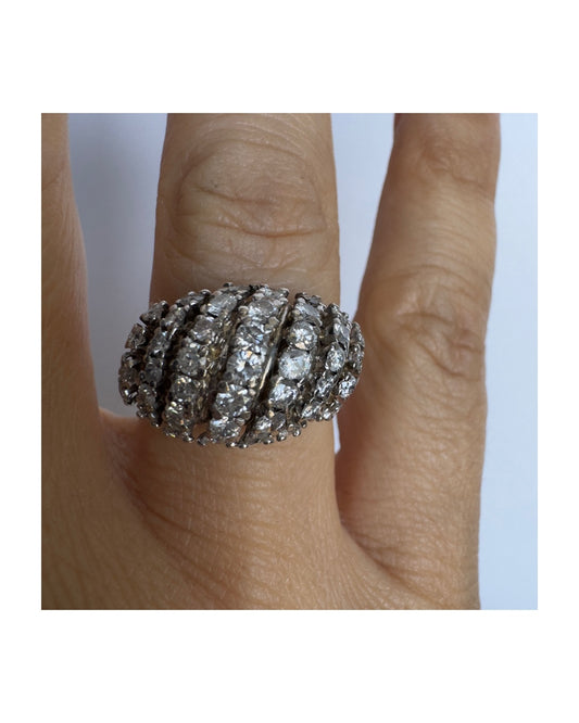 18K gold ring set with rows of sparkling Diamonds in a bold, sculptural design