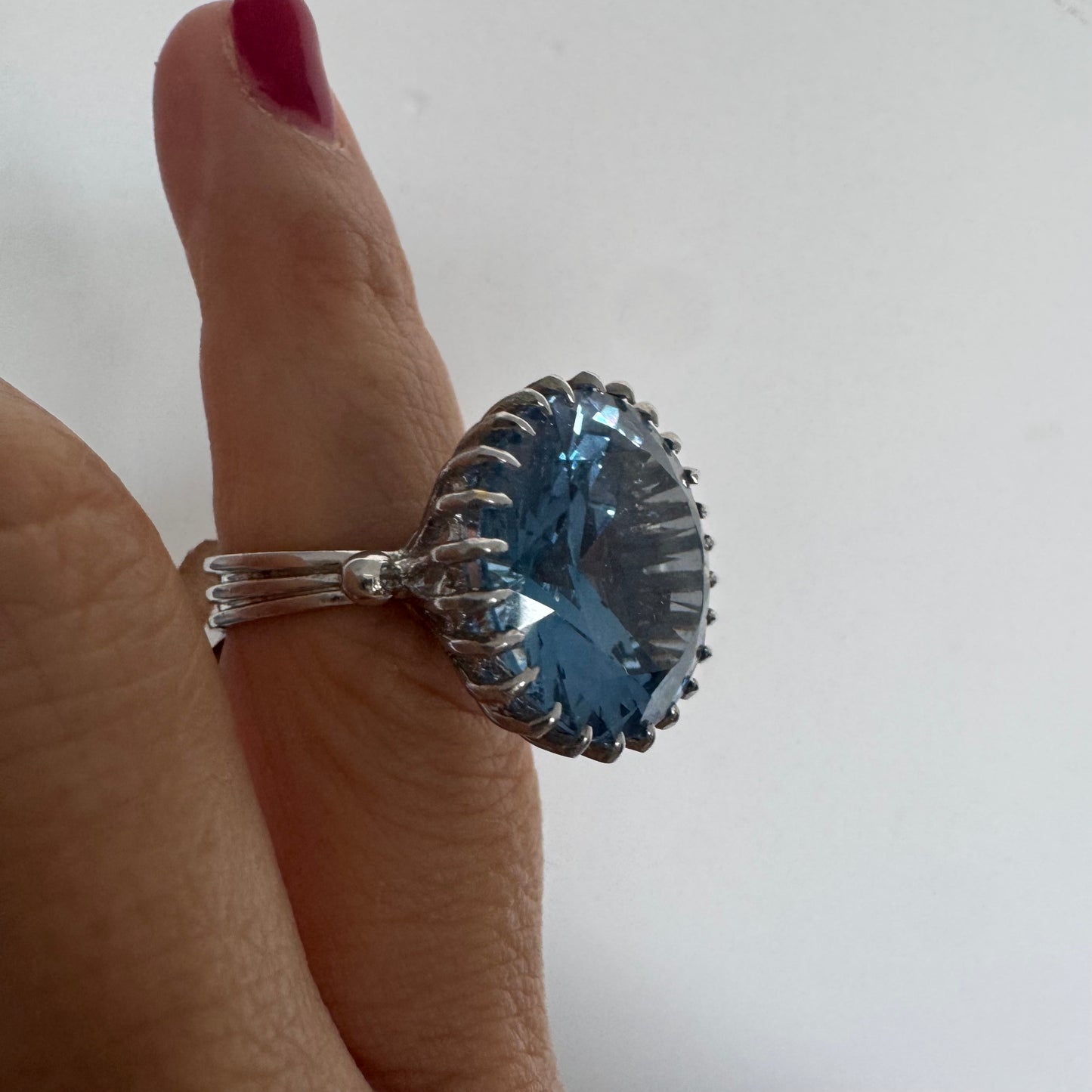 14K gold statement ring set with a large Blue Topaz stone