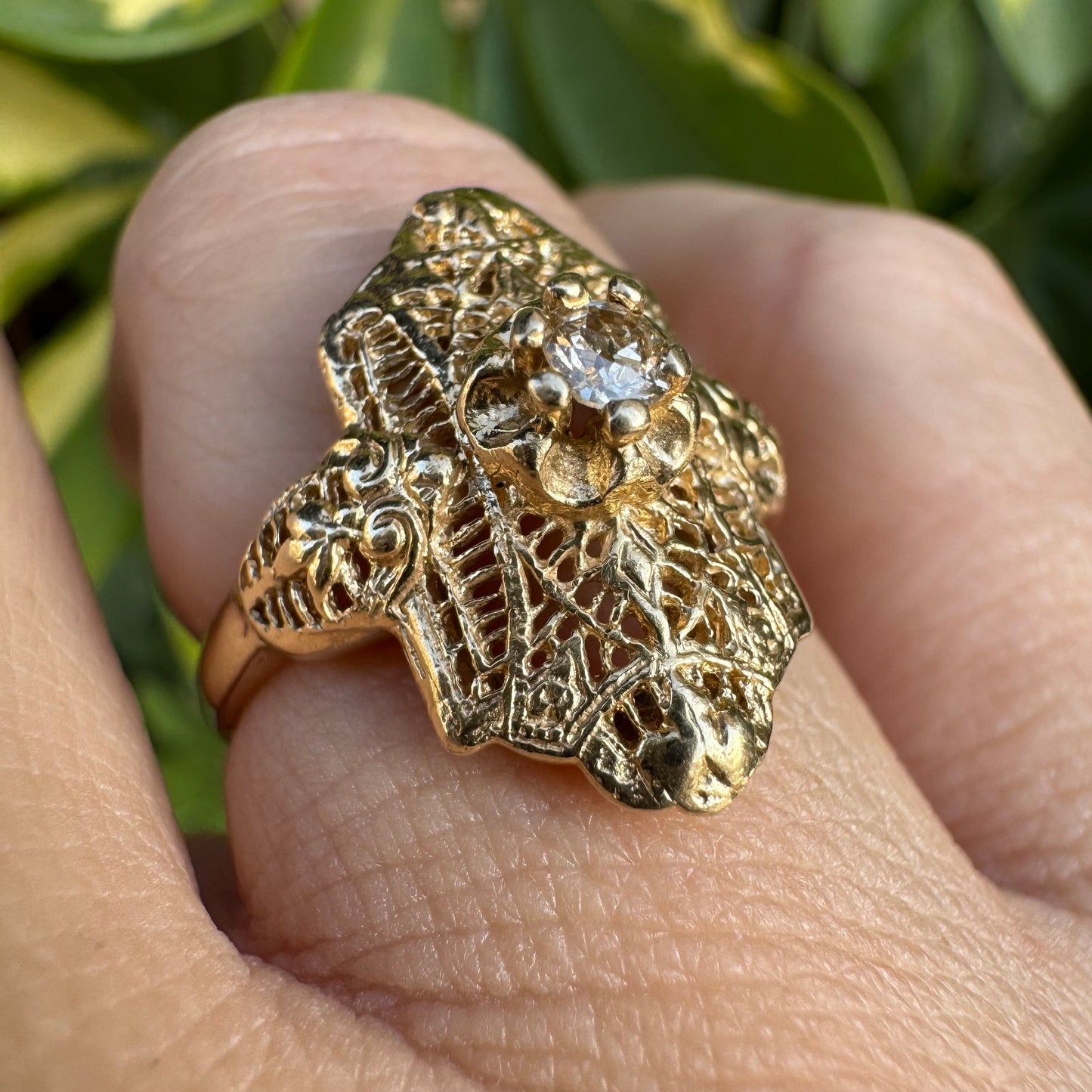 14K gold ring set with a Diamond