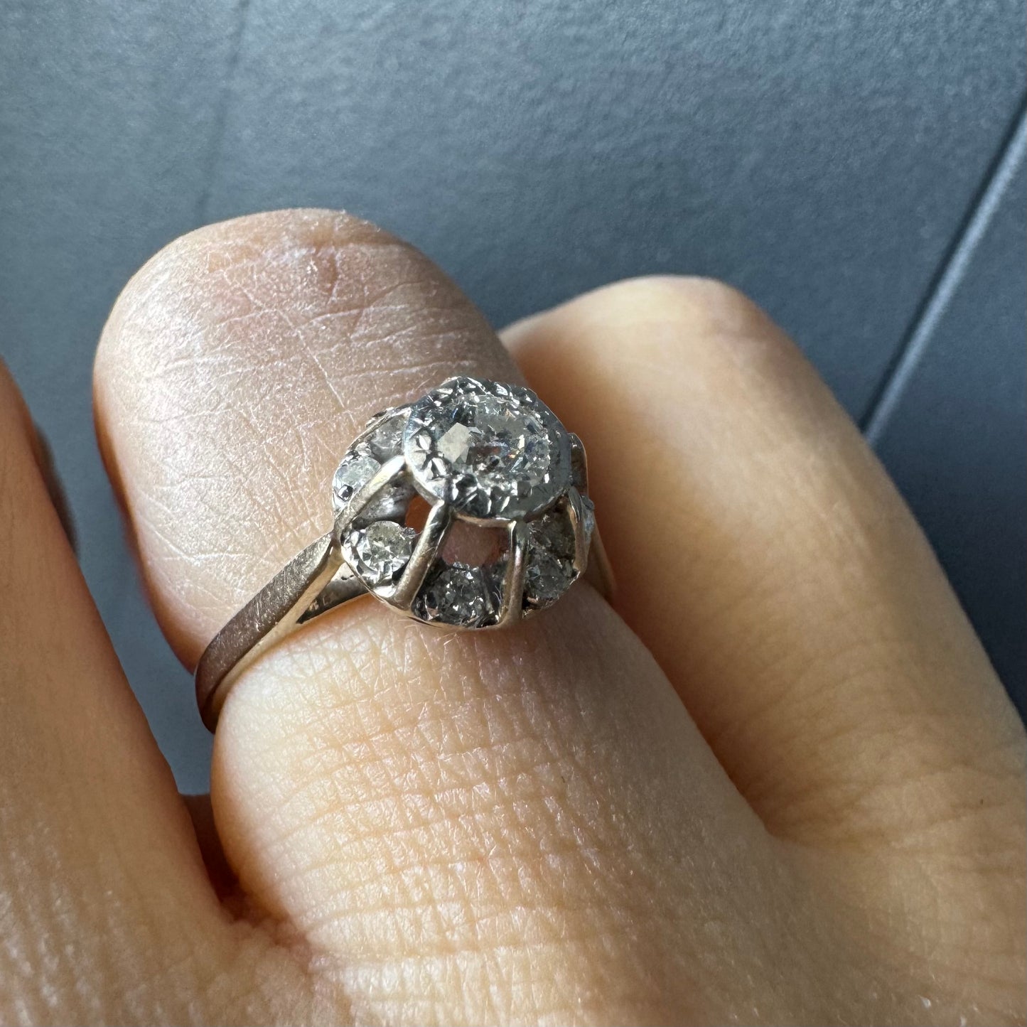 18K gold ring set with Diamonds in     a classic cluster-style