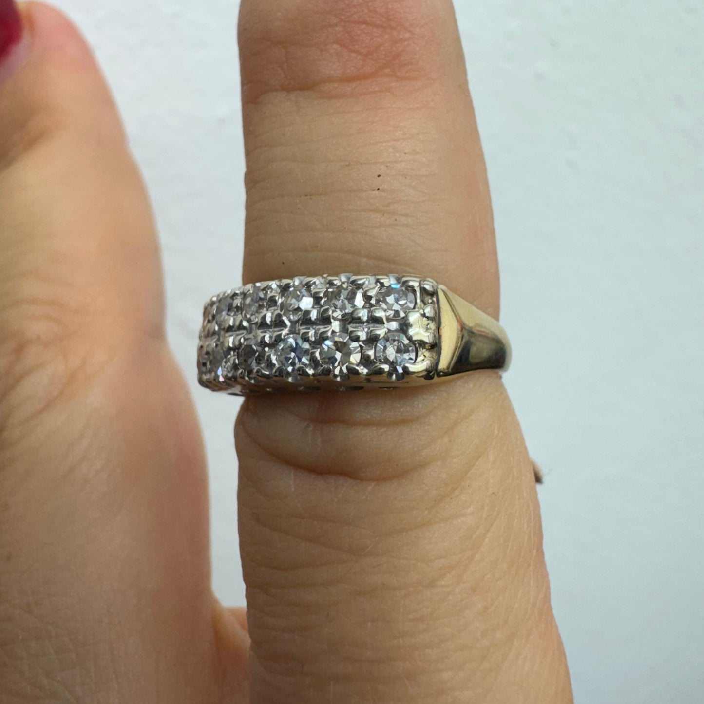 9K (14K) gold ring set with Diamonds in a bold, wide-band design.