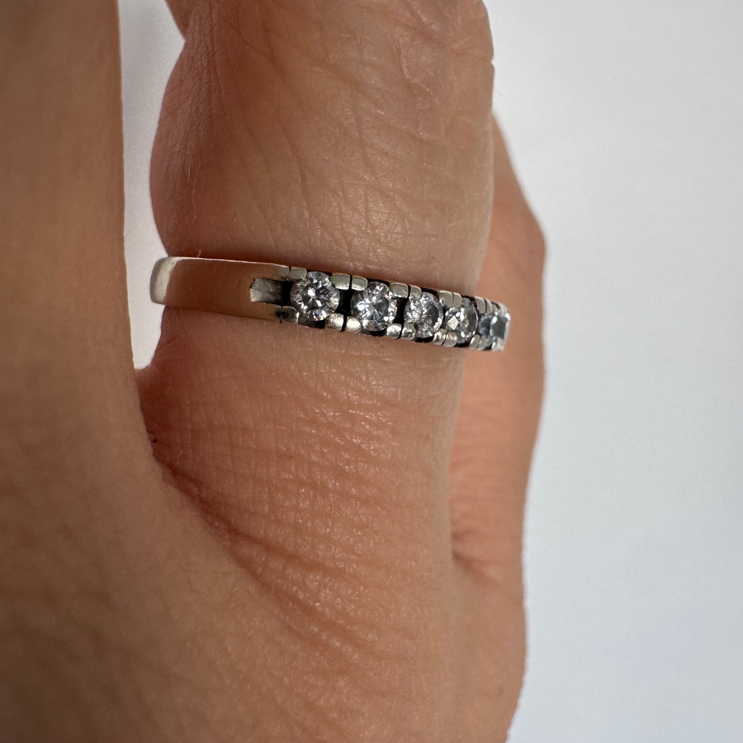 14K gold half eternity ring set with sparkling Diamonds.
