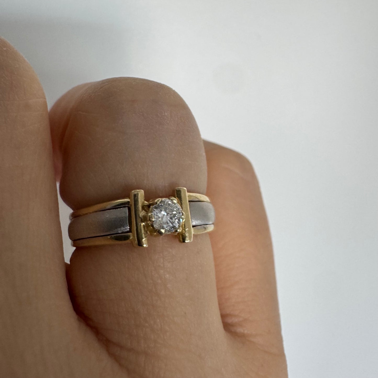 14K two-tone gold ring set with one center Diamond