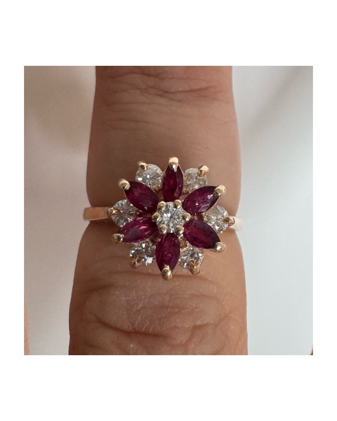 14K gold ring featuring a classic floral-inspired design set with marquise-cut Rubies & Diamonds.