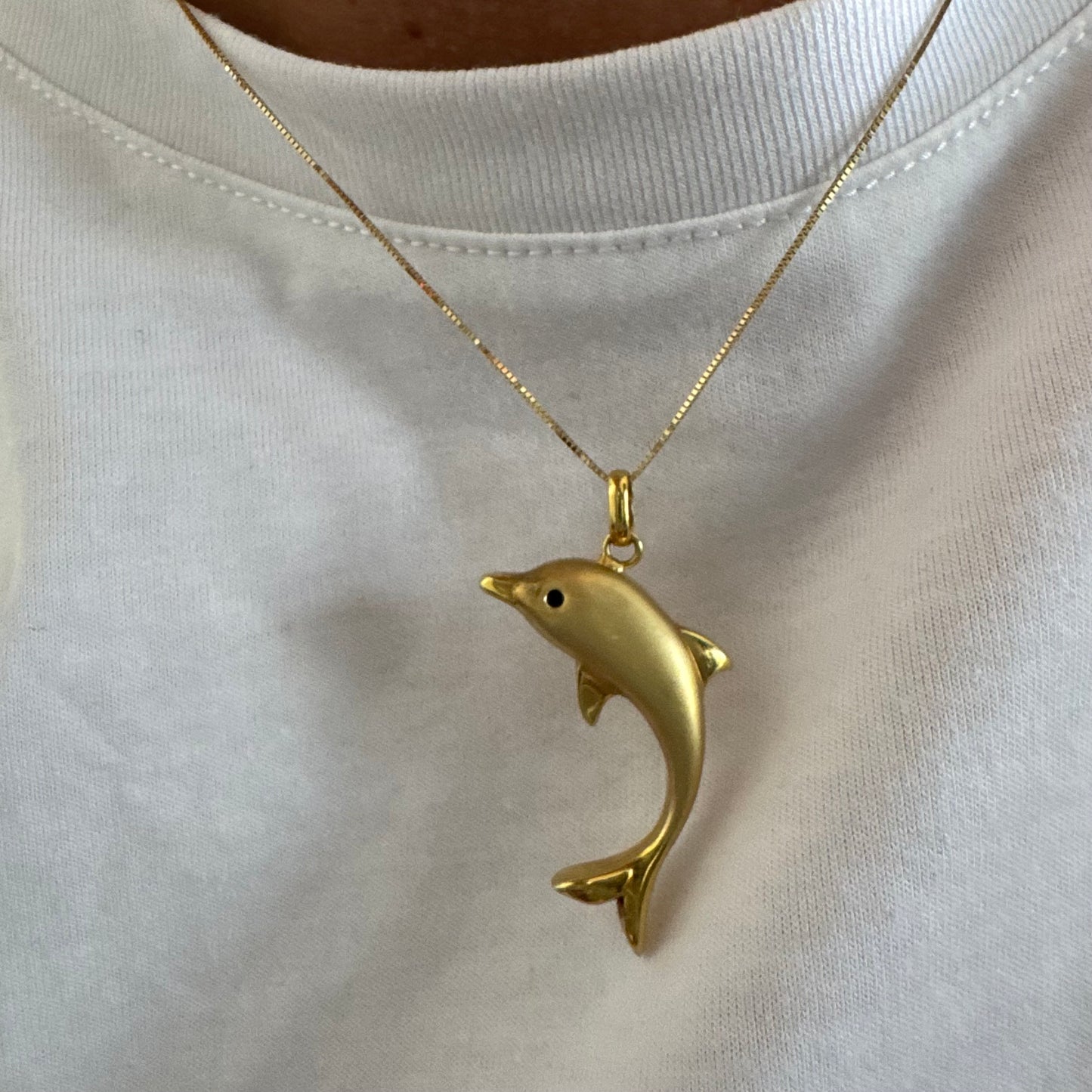 14K gold dolphin pendant with a smooth & polished finish.