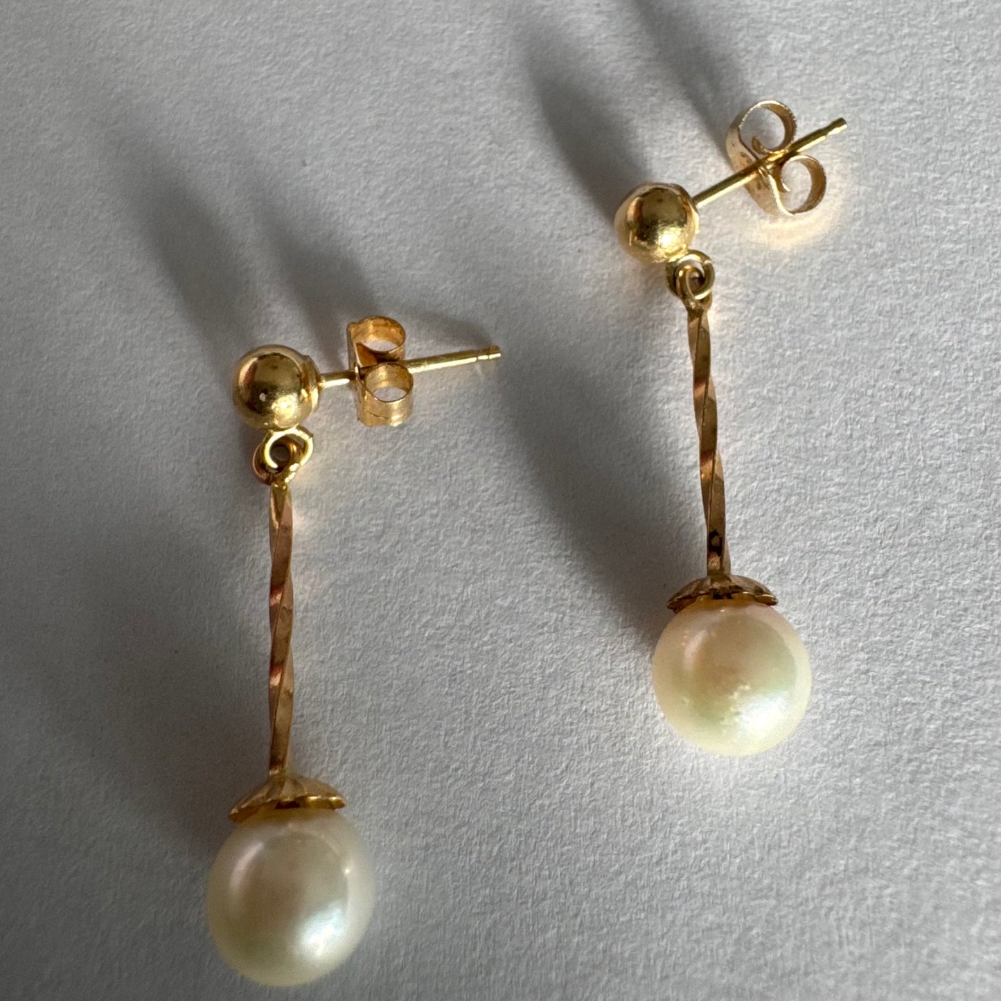 14K gold earrings set with Pearl