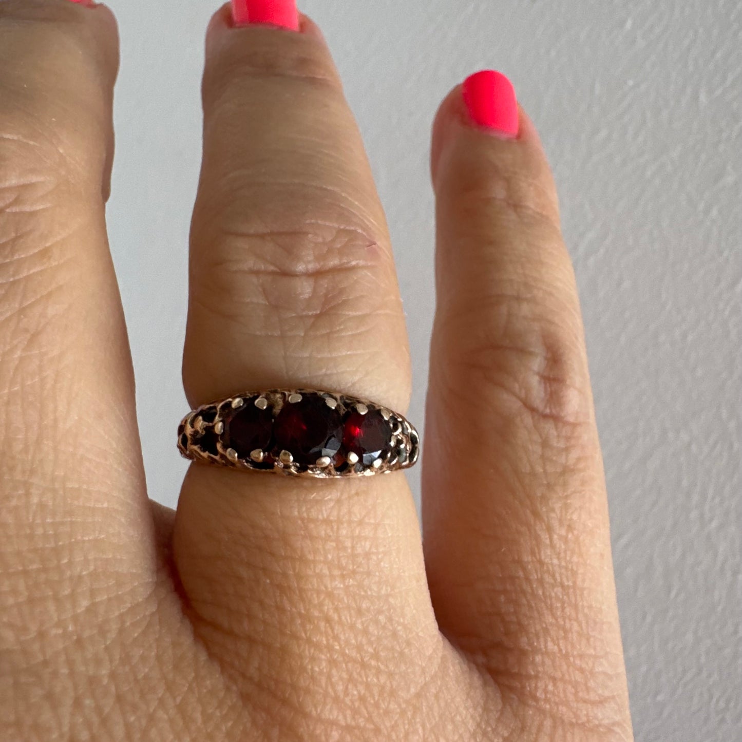9K gold ring set with deep red Garnet stones