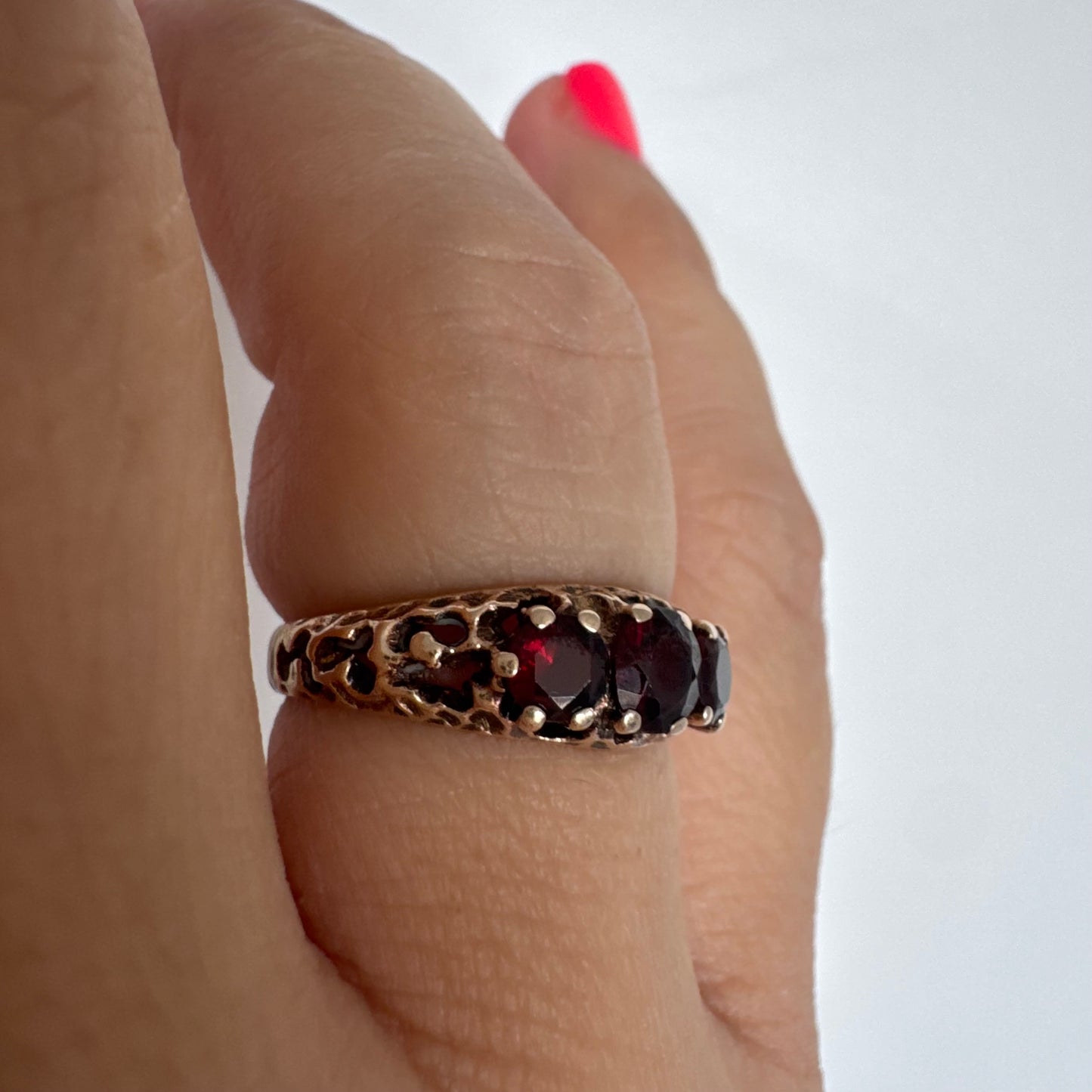 9K gold ring set with deep red Garnet stones
