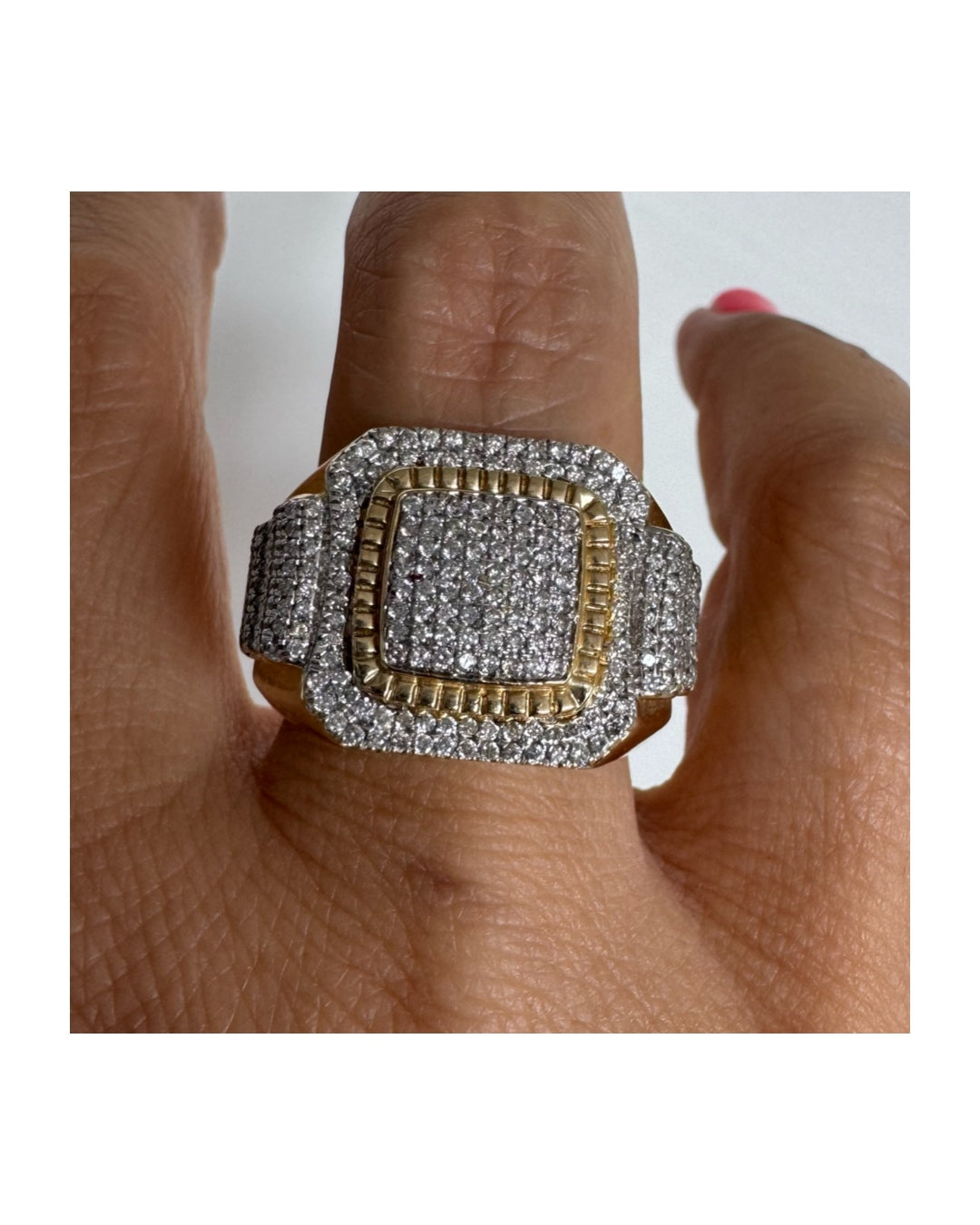 10K gold ring set with sparkling Diamonds in a bold geometric design.