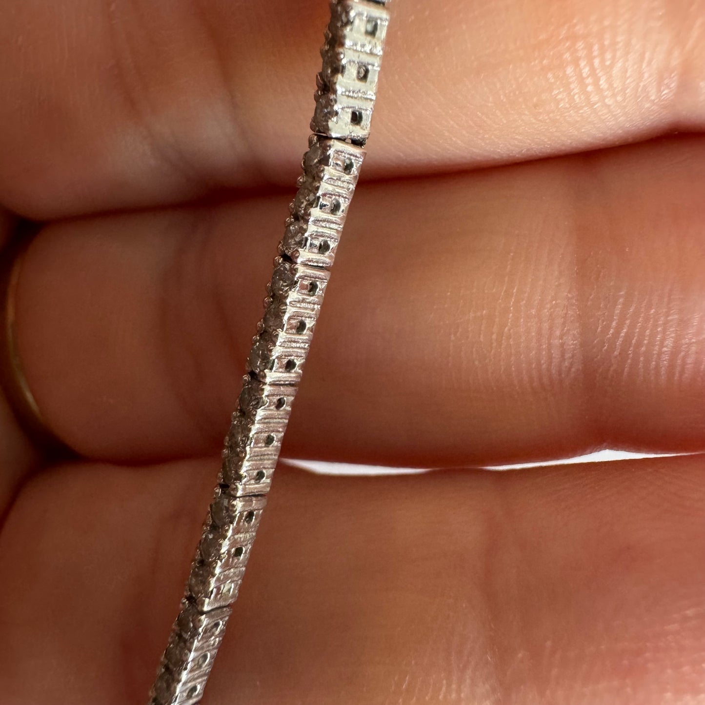 14K gold diamond bracelet with a sleek & elegant design.