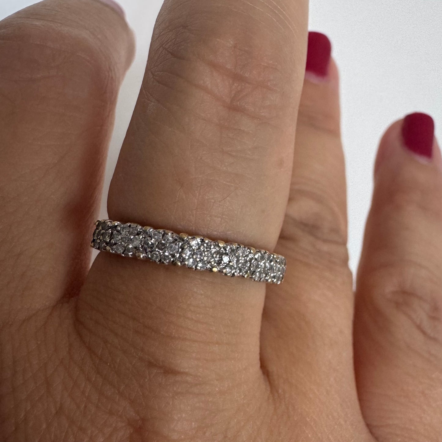 14K white gold half-eternity ring set with a row of Diamonds