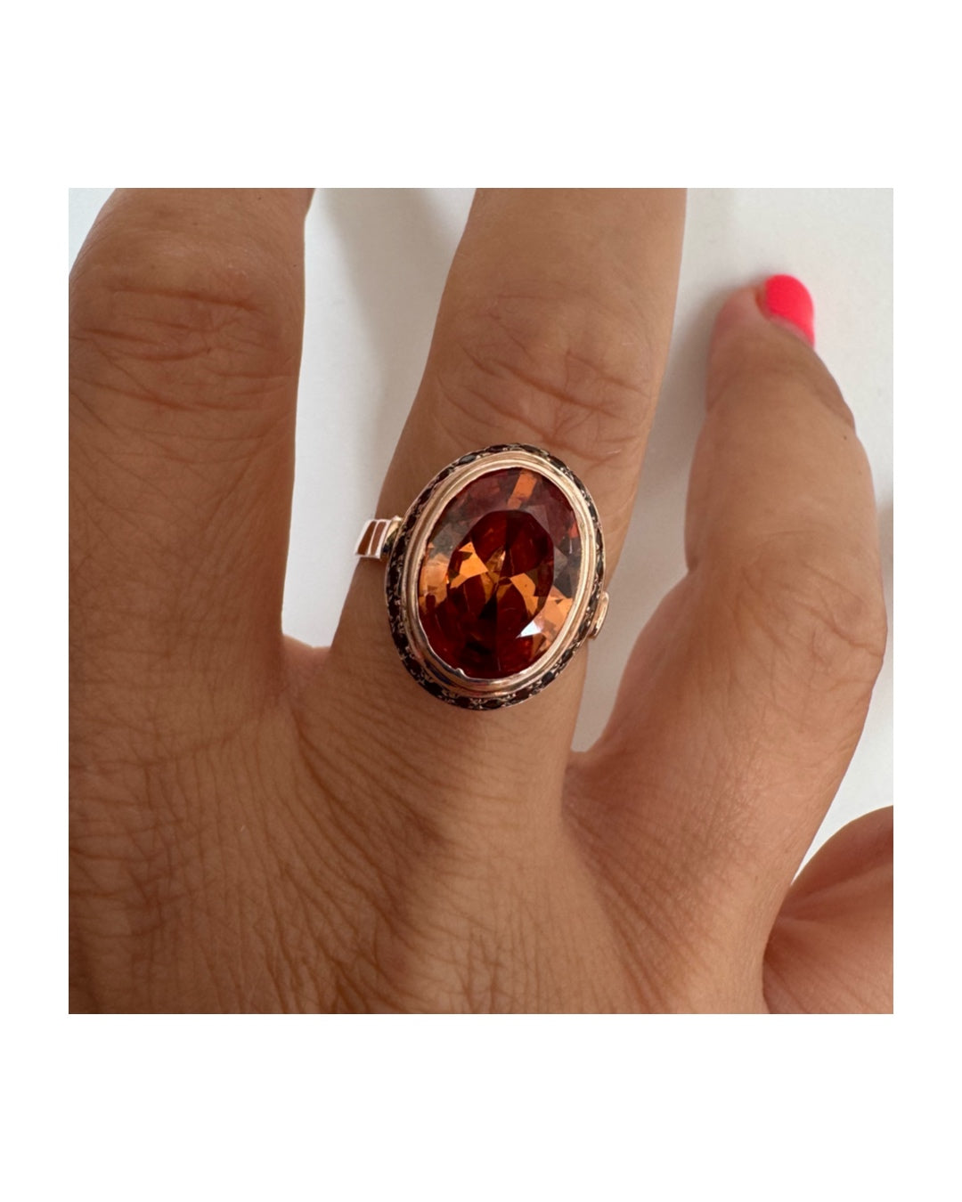 14K gold ring featuring a large cognac-toned Citrine, accented with delicate Ruby stones for a touch of rich color and contrast.