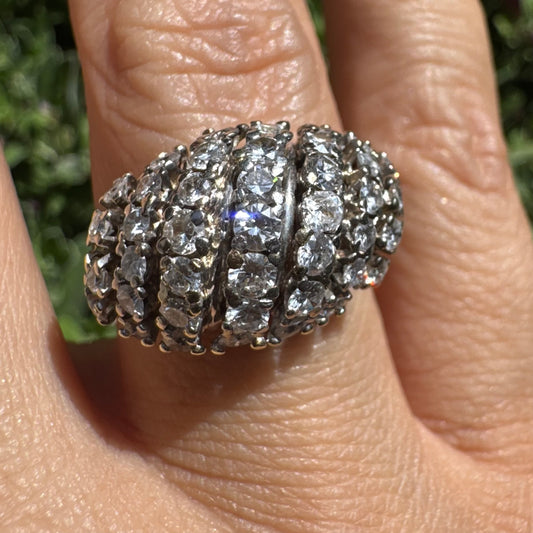 18K gold ring set with rows of sparkling Diamonds in a bold, sculptural design