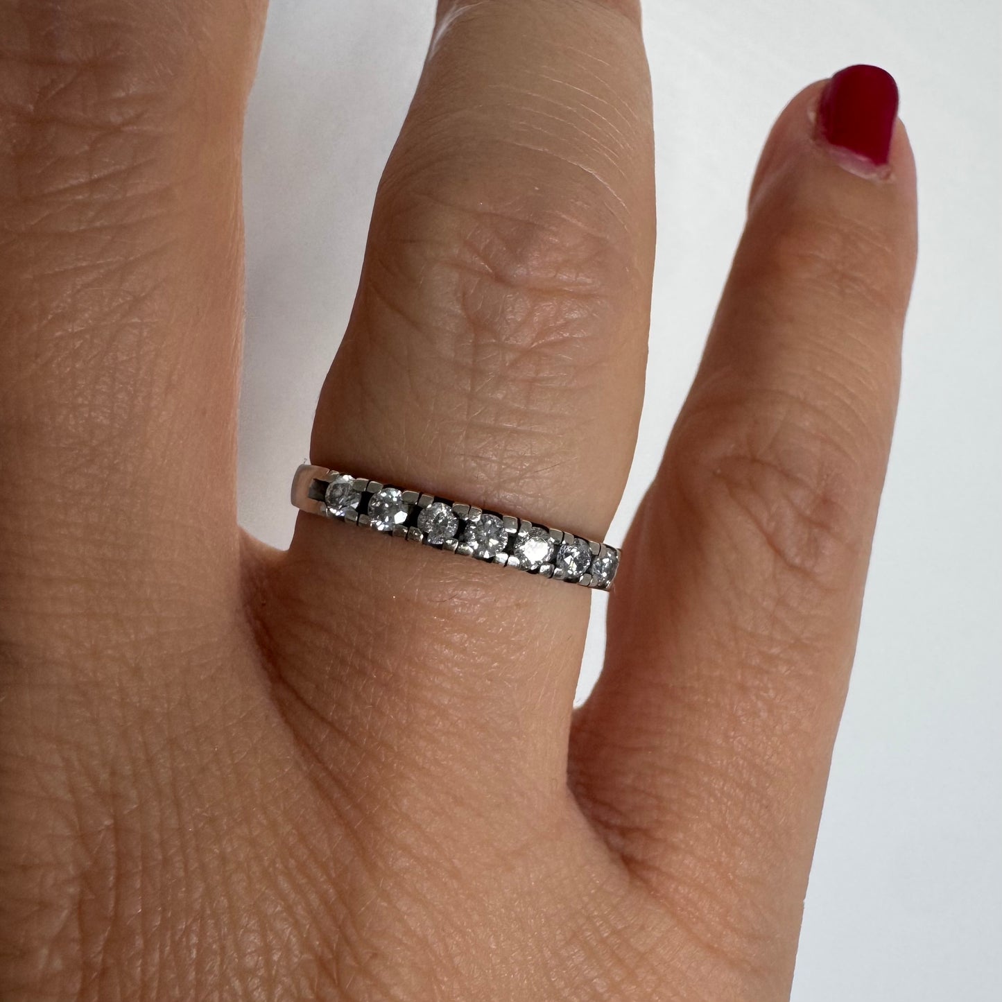 14K gold half eternity ring set with sparkling Diamonds.