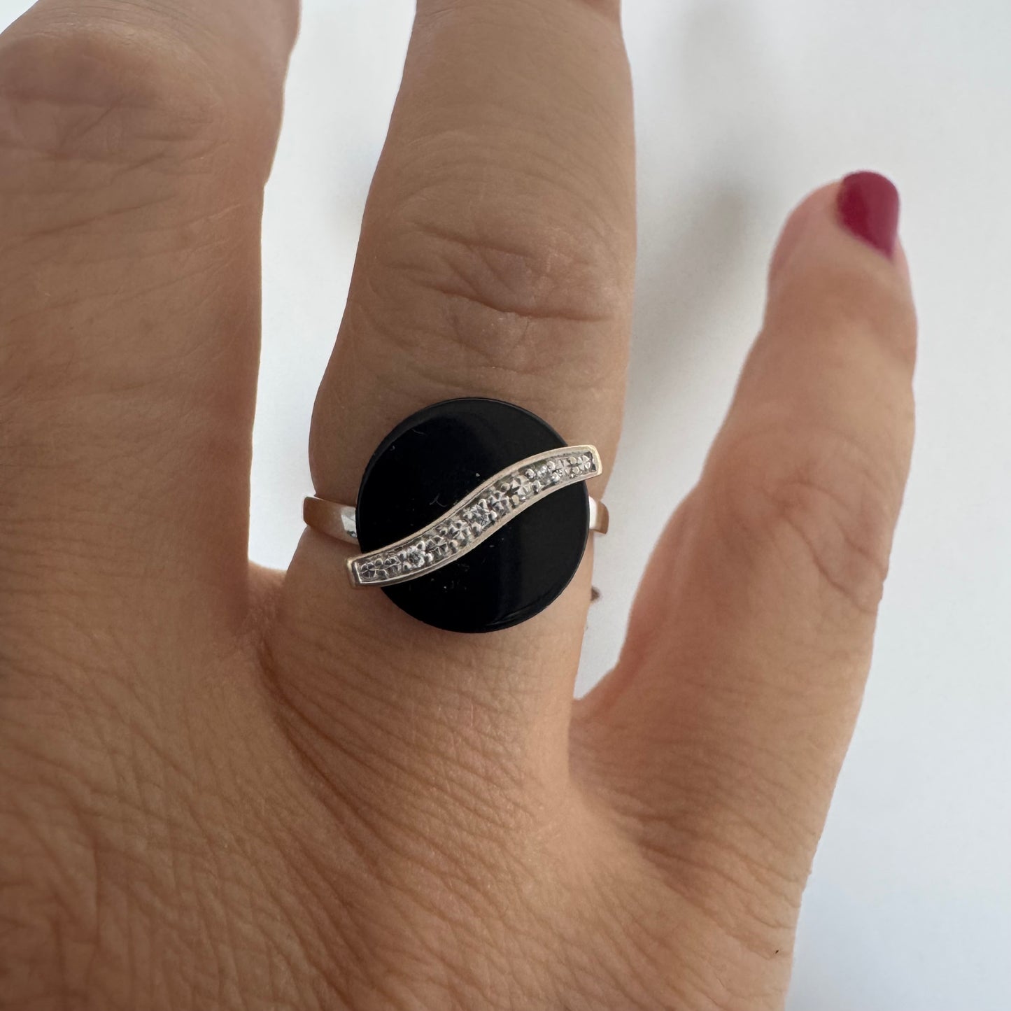 18K gold ring set with a polished round black Onyx