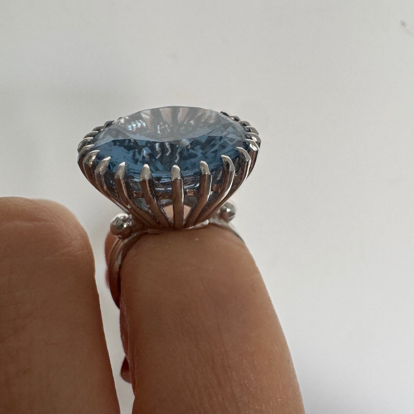 14K gold statement ring set with a large Blue Topaz stone